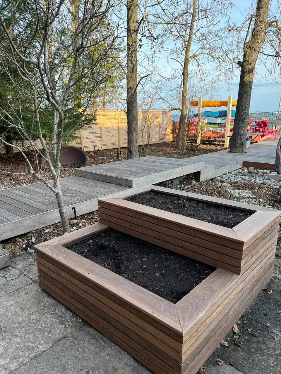 Lakeside deck with built-in planter boxes