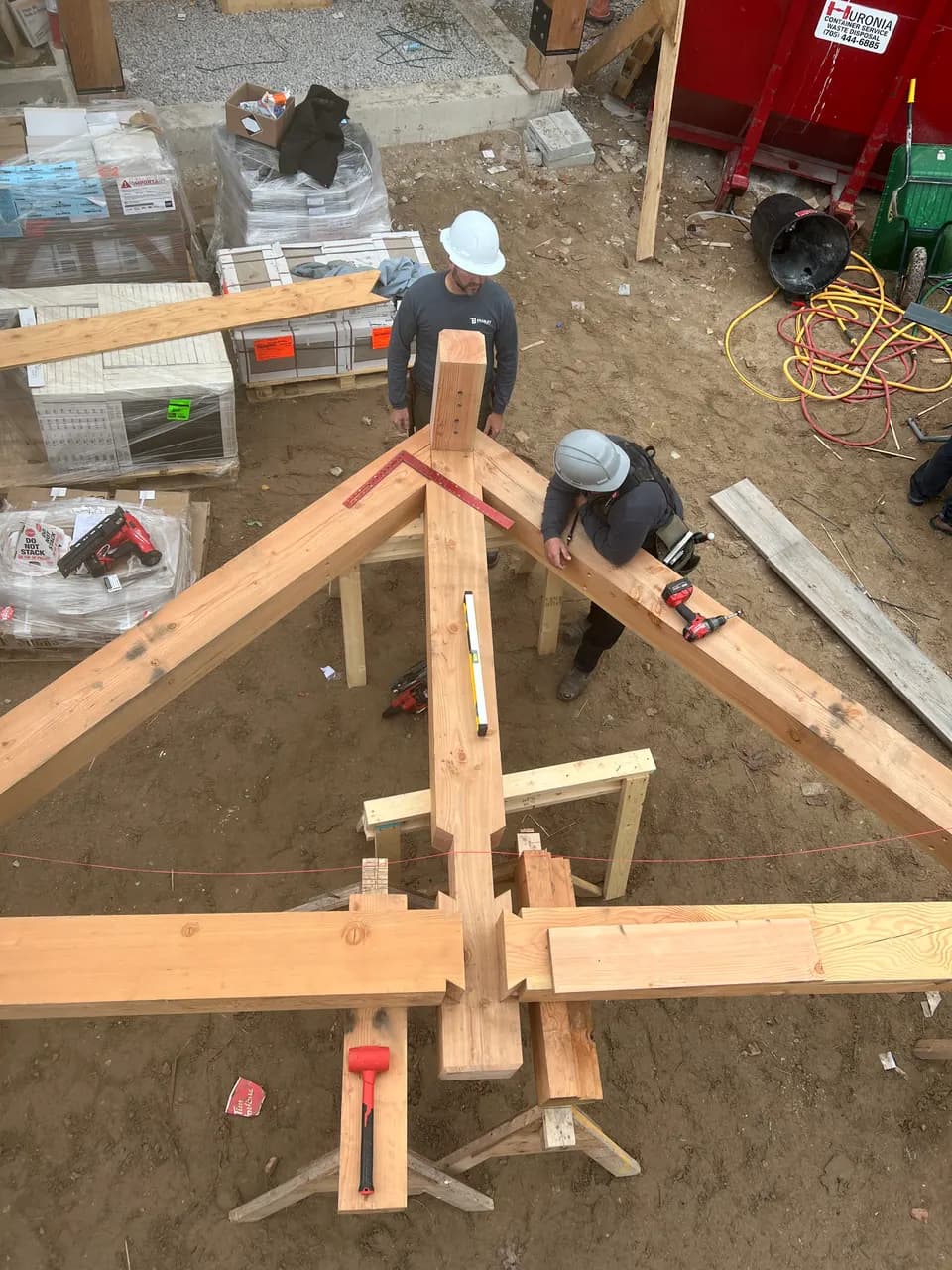 Timber-frame truss assembly on site by the JTL crew