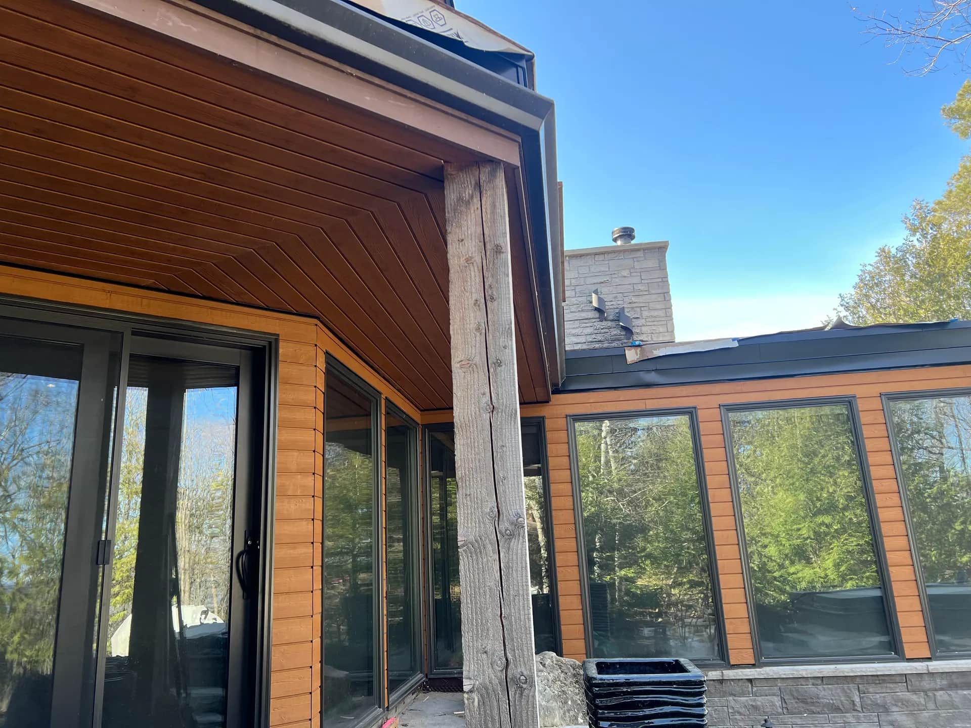 Golden-hour cedar-wrapped window bay, custom carpentry by JTL Projects